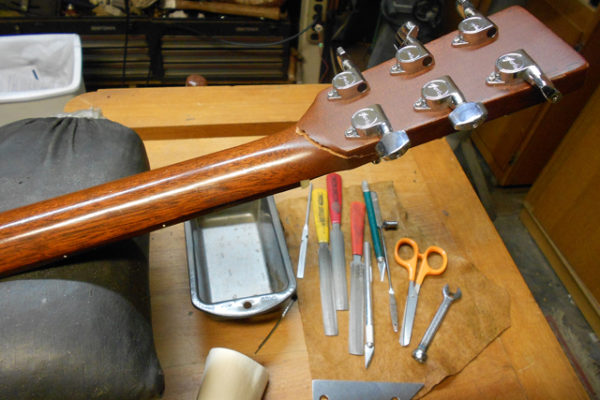 Fixing a broken head on a guitar