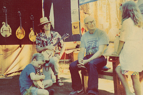 Arnie Gamble at Gil Schlitings booth at the California Bluegrass Festival about 1985.